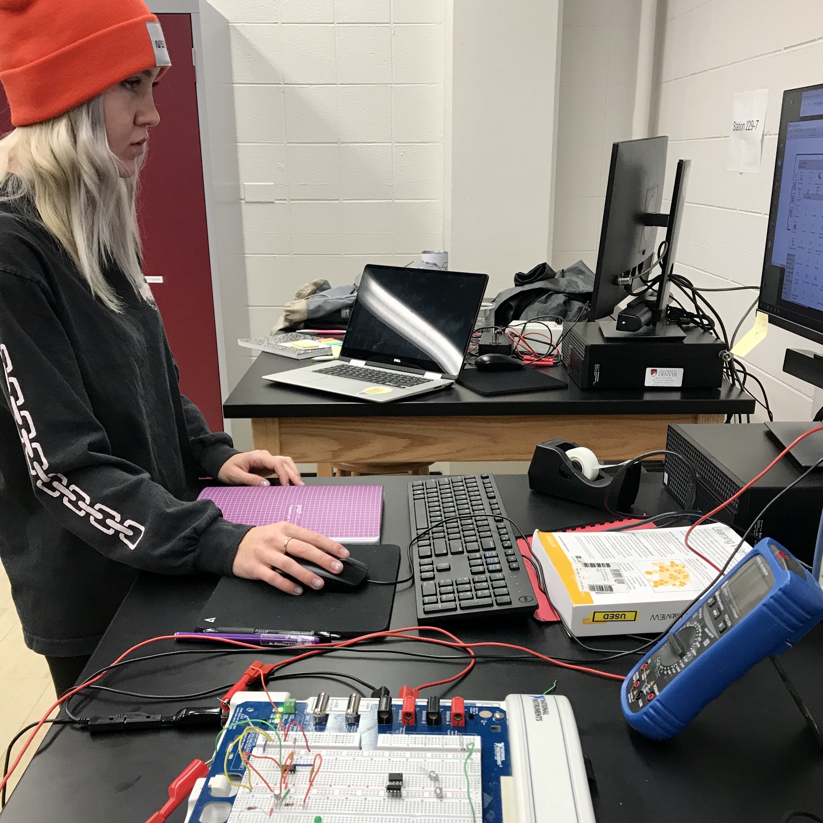 L'SPACE student Sable Hunt in in the lab working with circuits and computer programs at the University of Denver. She first learned how to build circuits and computer programs at the L'SPACE internship she attended in the summer of 2019 at ASU, Tempe, AZ. 